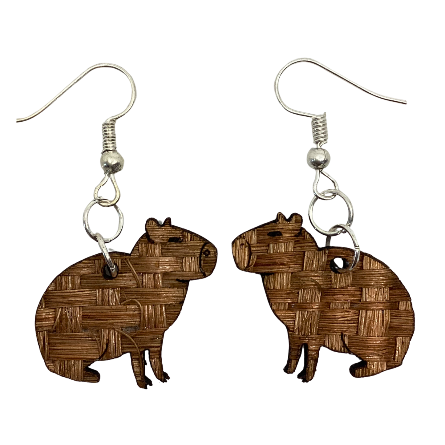 Aretes capibara sentado